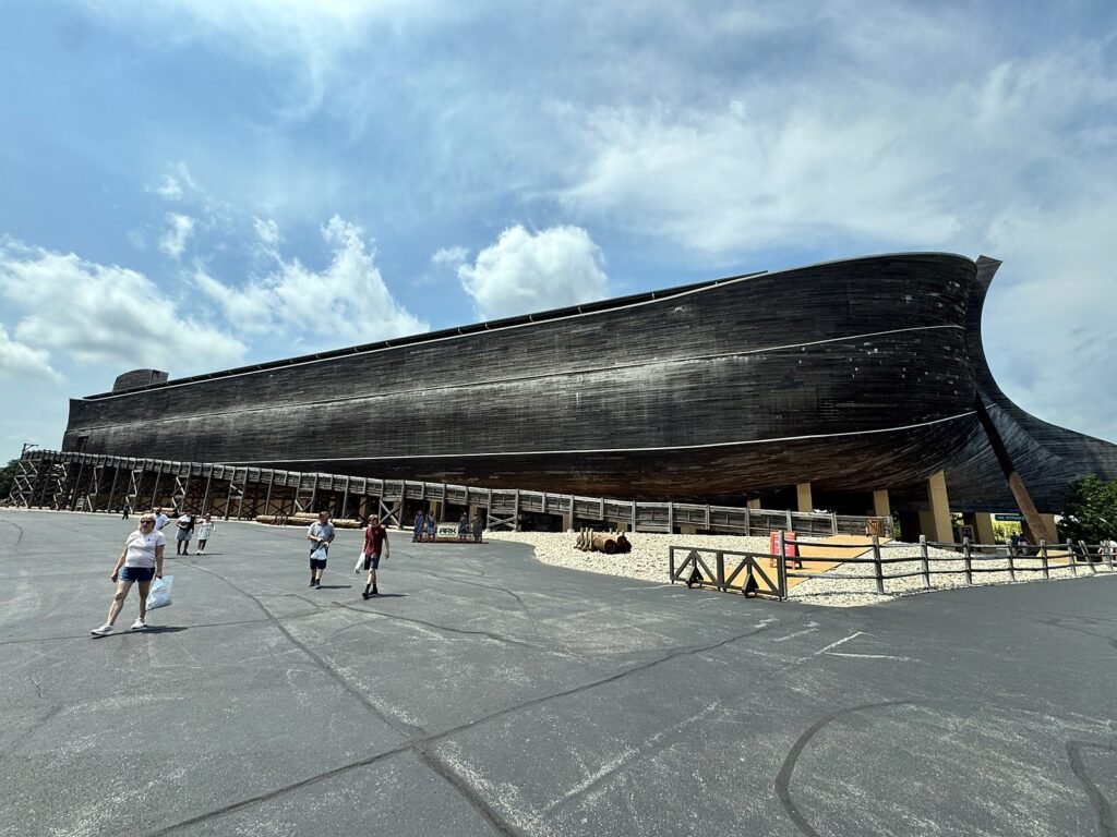 A Look Inside the Ark Encounter in Williamstown, Kentucky The Ark Encounter ship-shaped building seen from the parking area in Williamstown, Kentucky